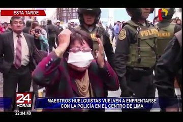 下载视频: Continúan los enfrentamientos entre la Policía y huelguistas en el Centro de Lima