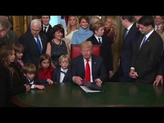 Trump signs executive orders as first official act
