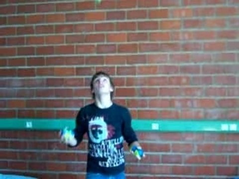 Jonglage à cinq balles