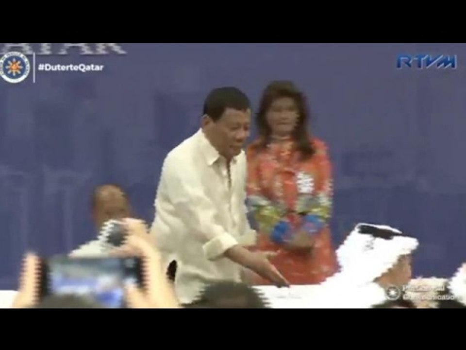 Duterte almost stumbles shaking hands with eager OFW
