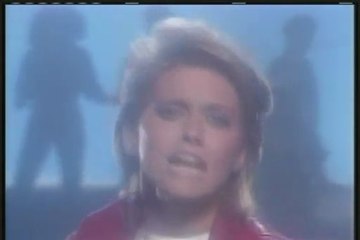 OLIVIA NEWTON-JOHN TIED UP