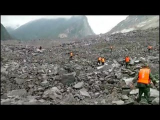 Around 100 people feared buried in China landslide--authorities