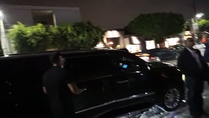 Kourtney Kardashian Turns Heads In Plunging Black Dress On Date With Boytoy