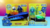 Et homme chauve-souris rouge-gorge marécage avec Imaginext batboat batmobile k croc ski joker