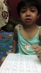 Clild angry with mom doing homework at home