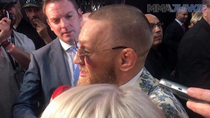 Raw video Conor McGregor wades through reporters following tough loss in The Money Fight