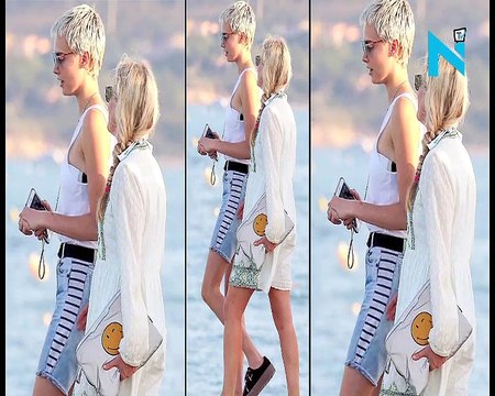 Yacht a duo! Cara Delevingne shows off her supermodel figure in a strapless white bikini as sister Poppy takes plunge in