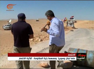 علما لبنان وسوريا ومعهما راية المقاومة.. ثلاثية ...