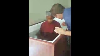 Girl Being Baptized