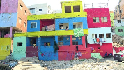Street art brings colour to rundown Beirut suburb