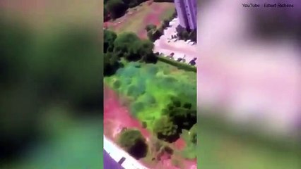 Man jumps off of his balcony wearing a parachute 'he bought  online' by مسلسل قصة عشق