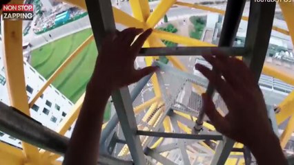 Un jeune homme escalade une grue de construction sans sécurité ! (vidéo)