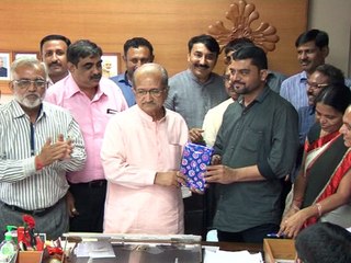 DONATION CHEQUE IN CHIEF MINISTER RELIEF FUND GIVEN TO GUJARAT MINISTER BHUPENDRASINH CHUDASMA