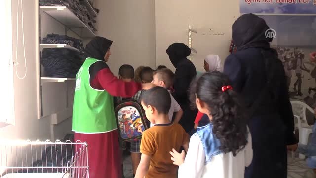 İhh'dan Yetim Çocuklara Bayramlık Giysi Yardımı