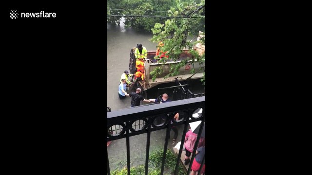 Neighbours make human chain to rescue woman in labour from floods