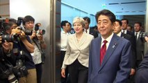 May tells Japan 'you can count on us'