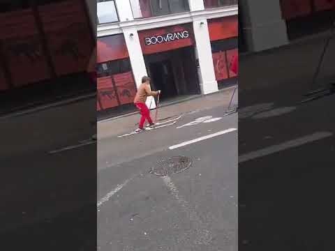 Friends Try Their Hands at Urban Skiing Through City Street