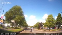 Dash cam captures hilarious road-crossing fail in UK