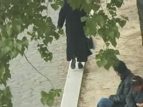 Something in the way she moves her coat