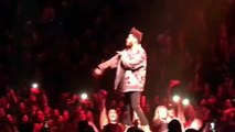 The Weeknd Proves He's All About Selena Gomez By Throwing Back A Bright Pink Bra Launched On Stage -- Watch Video