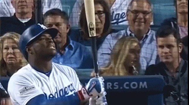 Yasiel Puig licks his bat, and realizes pine tar tastes terribl!
