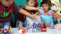 Kinder joy surprises eggs with kids Elsa and Spiderman