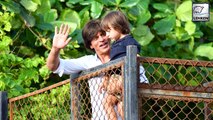 Shah Rukh Khan And Son AbRam Khan Waving At Fans During EID