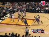 Alonzo Mourning stuff a drive to the basket by the Pistons'