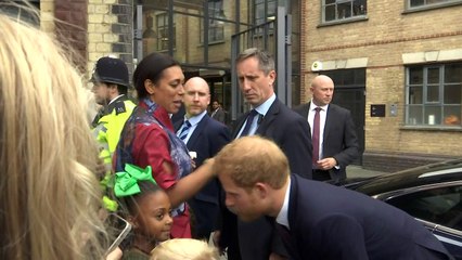 Prince Harry meets Grenfell schoolchild Aisha