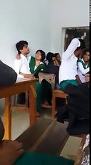 Girl kissed guy in class room