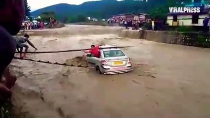 Woman Rescued After Car Is Stranded In Flash Flood In India