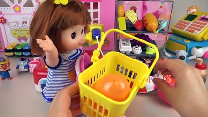 Disney Mart cash register and baby doll with Kinder Joy eggs toys