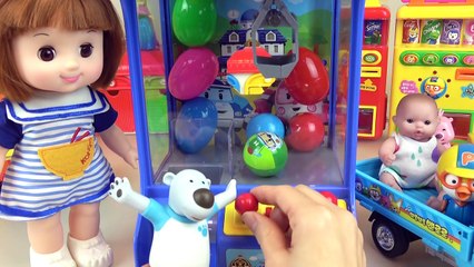 Poli surprise eggs crane machine and Baby doll, Kinder Joy toys