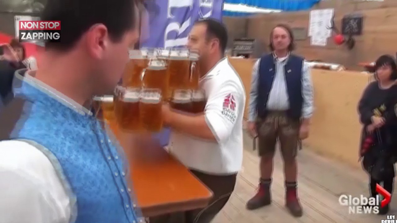 Il porte 29 chopes de bières sur 40 mètres, un champion ! (Vidéo)