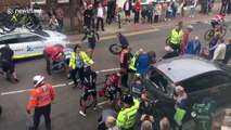 Cyclists crash into parked car during Tour of Britain