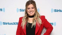 Kelly Clarkson Explains Why She is Judging 'The Voice' Instead of 'American Idol' | Billboard News