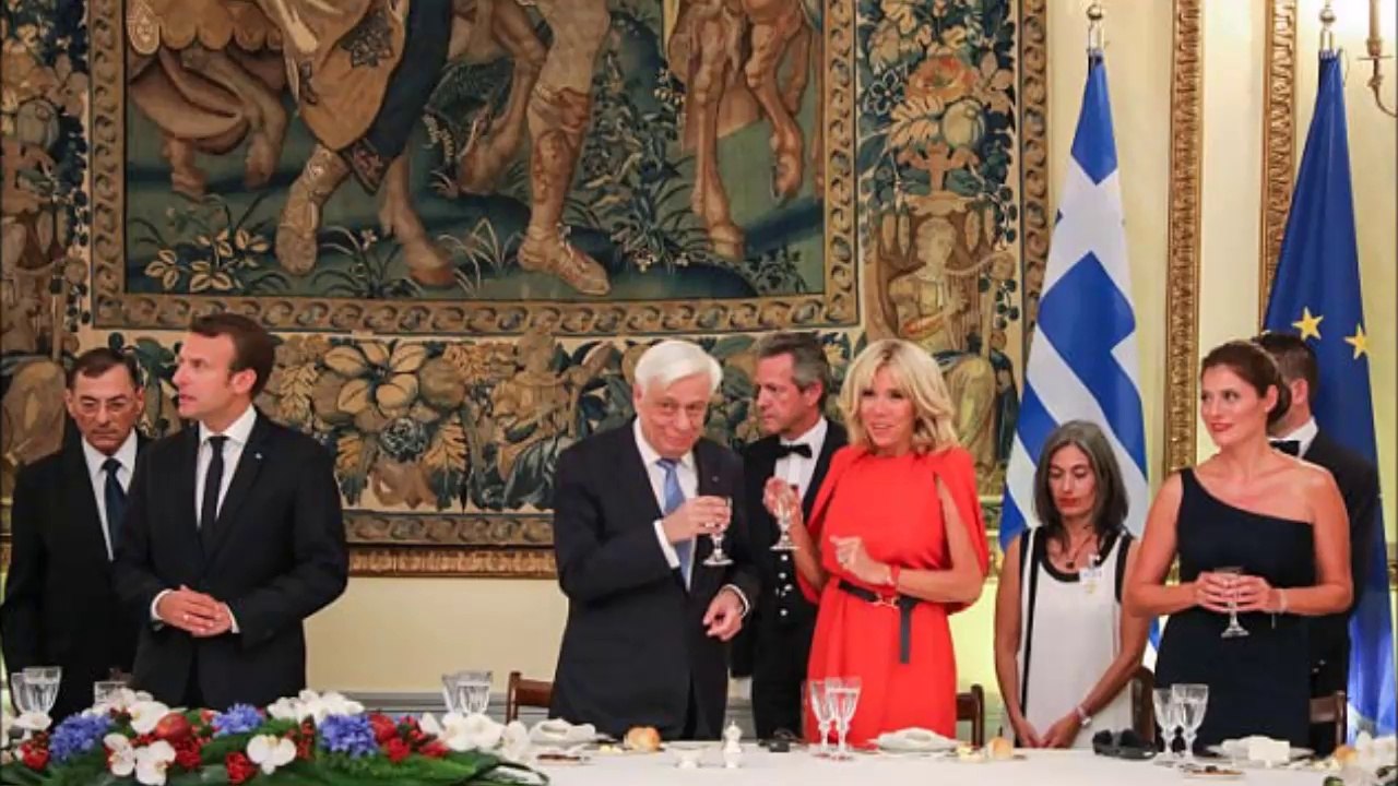 French First Lady Brigitte dazzles in scarlet dress for state dinner in Athens