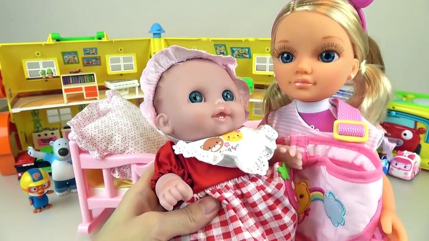 Baby Doll diaper and Nancy dolphin ambulance doctor toys