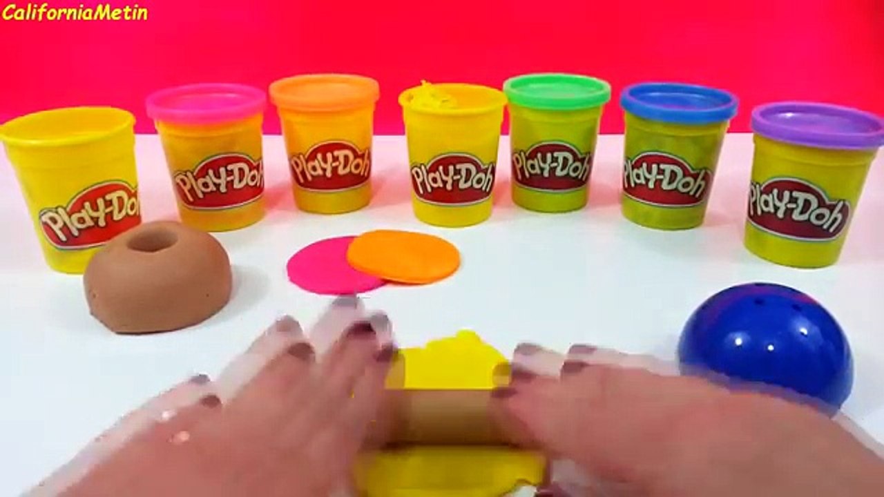 Petit gâteau pâte une fleur Comment faire faire jouer arc en ciel à Il avec doh