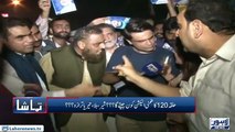 Woman asks PMLN MNA to drink 'contaminated water' of NA120 while trying to snatch mineral water from him