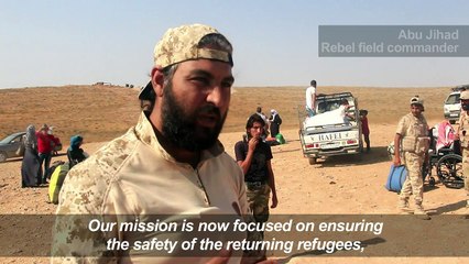 Syrian refugees return from Jordan through rebel crossing