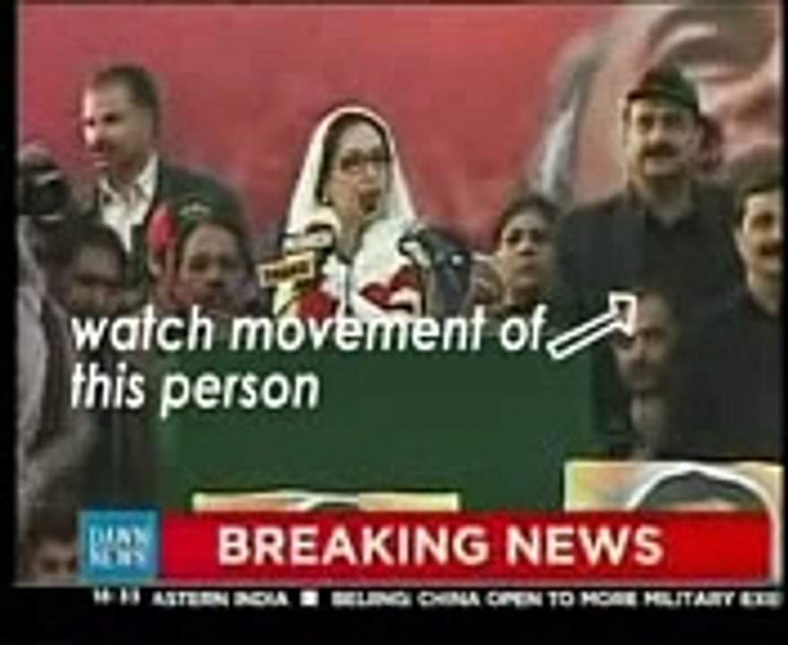 Benazir Bhutto, ex prime minster of Pakistan. Last public meeting before death. Man behaving suspiciously.
