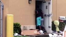 Cameras caught looters ransacking a Miami Foot Locker store,  as police arrived