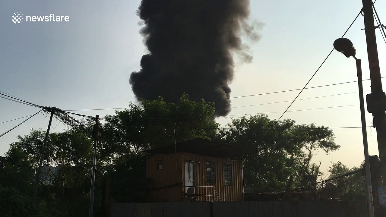 Huge cloud of black smoke rises from plastic recycling plant fire