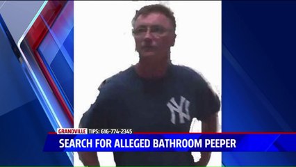 Woman Catches Man Watching Her in Public Restroom