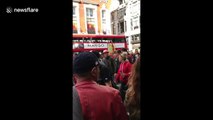 Chanting German football fans take over Oxford Street
