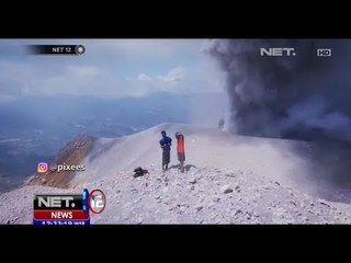 Dua Pemuda Unggah Foto di Gunung Sinabung yang Sedang Erupsi - NET12