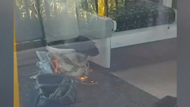 Video shows suspected bomb burning on London tube train