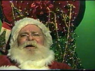 Santa reads: "t'was the Night Before Christmas"