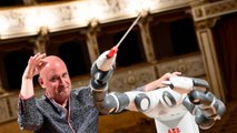 Watch humanoid robot conduct Italian orchestra